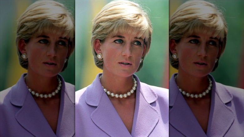 Close-up of Princess Diana talking in a purple suit
