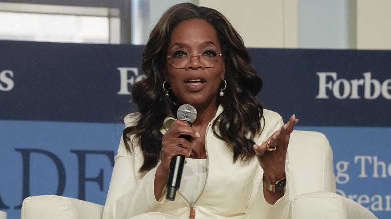 Oprah Winfrey speaking with microphone