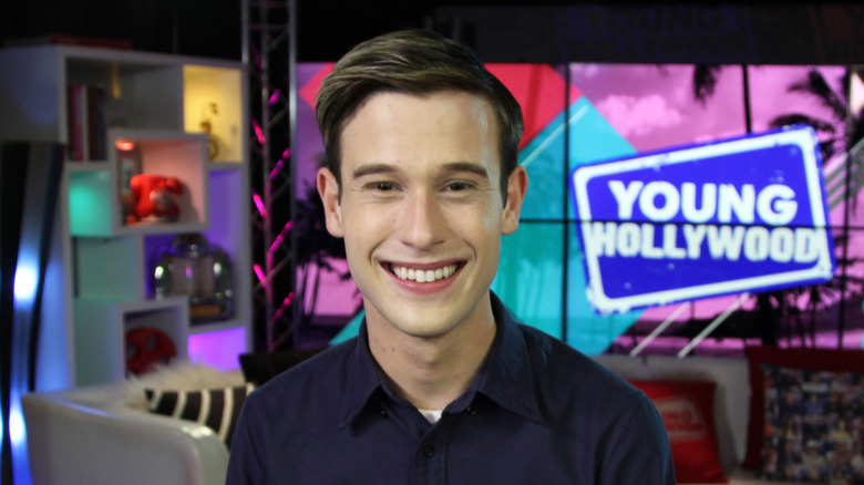"Hollywood Medium" star Tyler Henry smiles inside the Young Hollywood studio