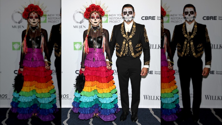 Kelly Ripa and Mark Consuelos in costumes in 2023