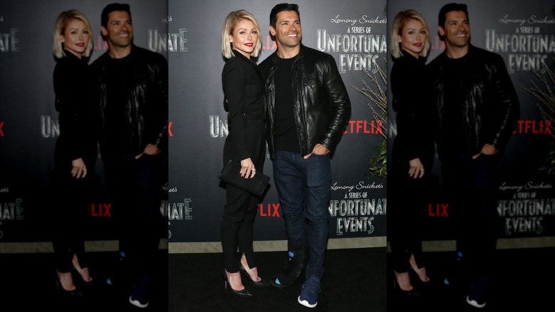 Kelly Ripa and Mark Consuelos posing in 2017