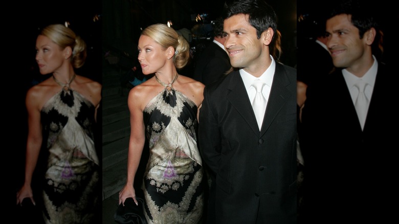 Kelly Ripa and Mark Consuelos walking in 2004