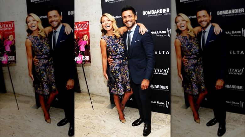 Kelly Ripa and Mark Consuelos posing in 2013