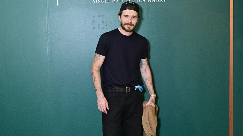 Brooklyn Beckham smiling at the camera