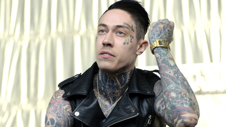 Trace Cyrus performing on stage