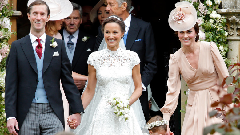 Pippa Middleton and James Matthews with Princess Catherine on their wedding day