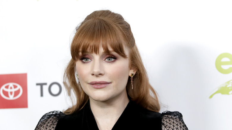 Bryce Dallas Howard with bangs, wavy half-up hair
