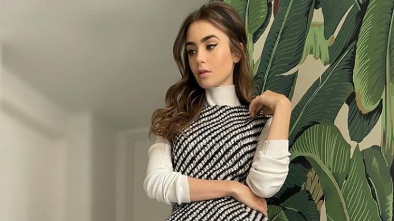 Lily Collins with a '60s hairstyle