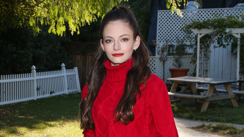 Mackenzie Foy with half-up long waves