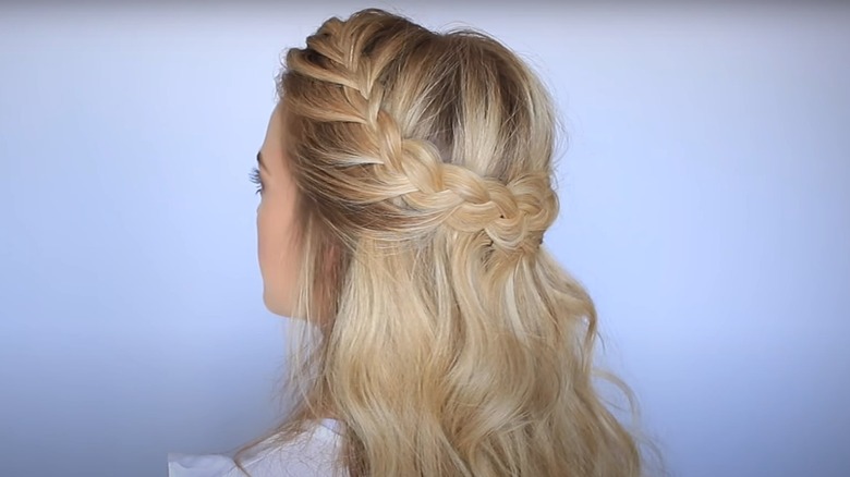 A half-up hairstyle