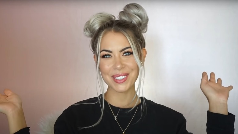 Woman with space buns