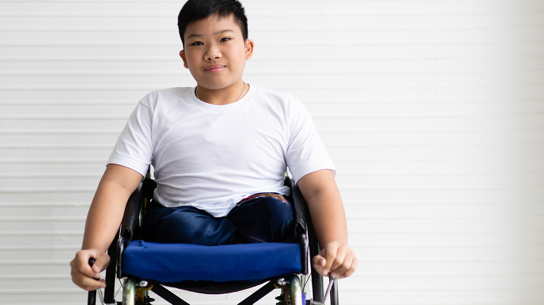 Young Asian man without legs 