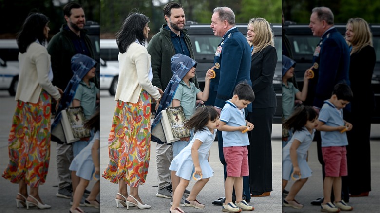 U.S. Air Force Gen. James Hecker talks with Vice President JD Vance and his wife Usha Vance (L) before departing Ramstein Air Base, Germany enroute to the U.S. on April 24, 2025 in Ramstein-Miesenbach, Germany (2025)
