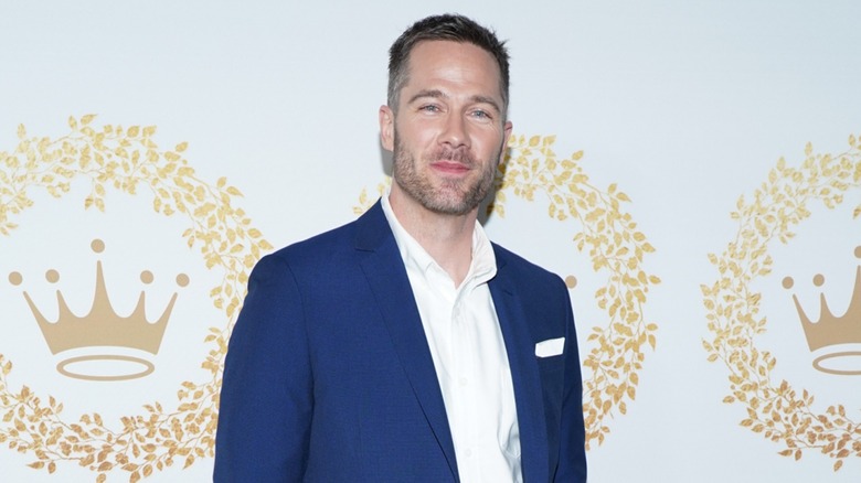 Hallmark star Luke Macfarlane smiling