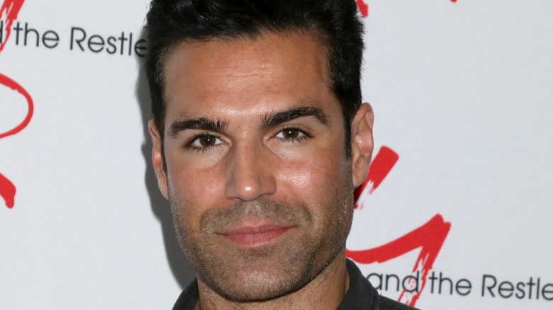 Jordi Vilasuso the actor who plays Rey on The Young and the Restless smiling softly