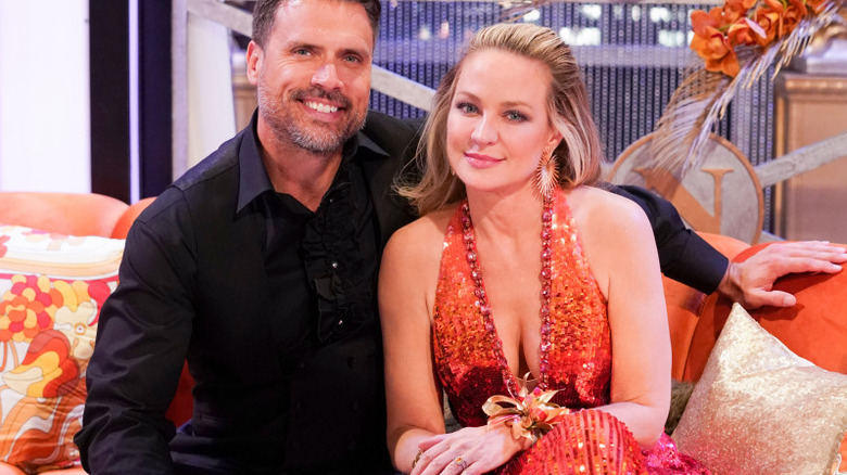 Joshua Morrow and Sharon Case smiling together