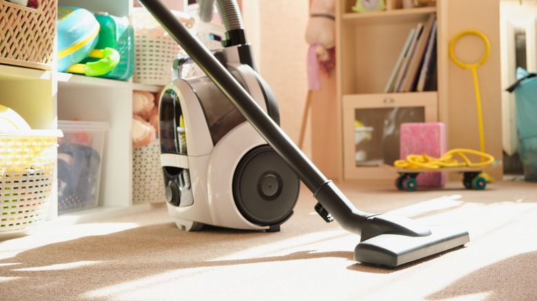 close-up on vacuum in child's bedroom