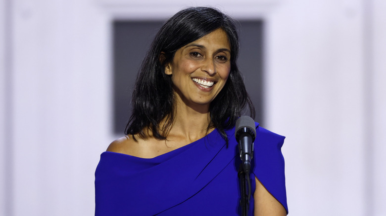 Usha Vance blue dress with microphone