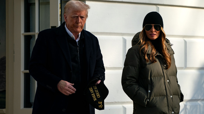 Donald Trump and Melania Trump walking with a notable distance between them