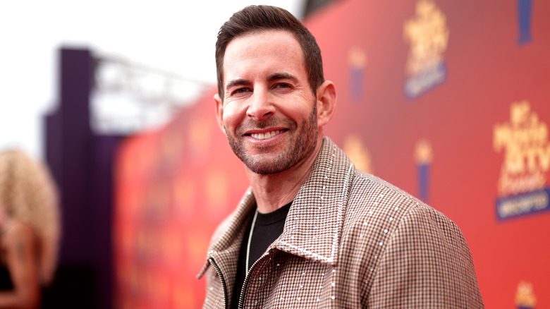 Tarek El Moussa smiling at the MTV Movie & TV Awards