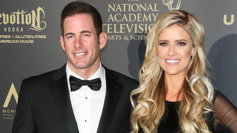 Tarek El Moussa and Christina Haack posing at an event in their finery