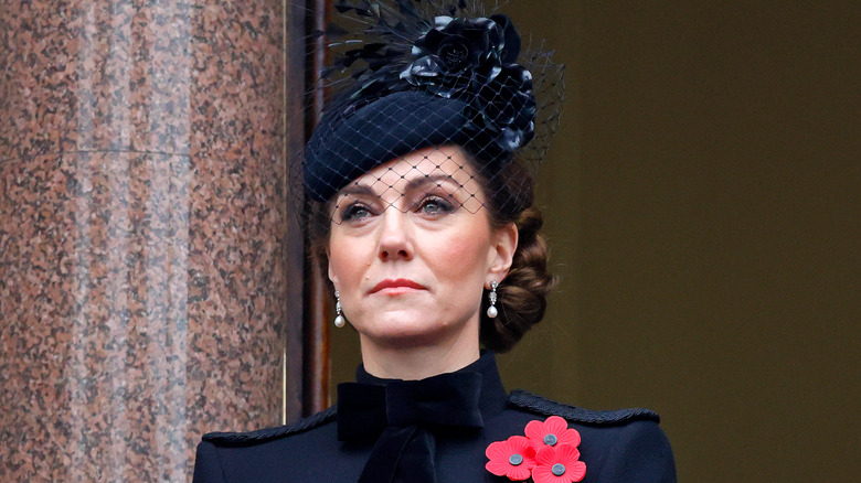 A solemn-looking Princess Catherine dressed in black
