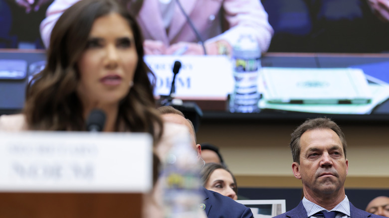 Bryon Noem (R), husband of U.S. Secretary of Homeland Security Kristi Noem, looks on as she testifies during a House Judiciary Committee hearing in the Rayburn House Office Building on March 04, 2026 in Washington, DC.