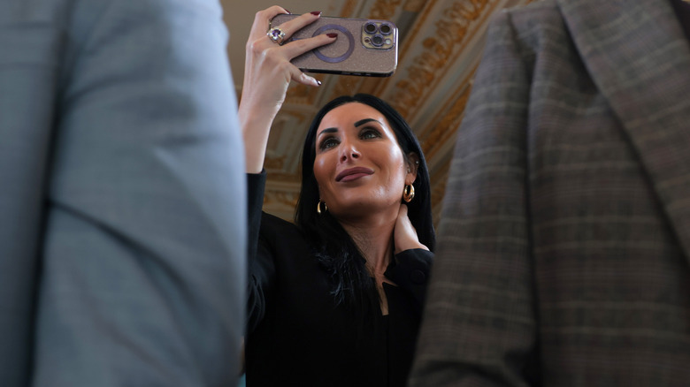 Laura Loomer taking a selfie