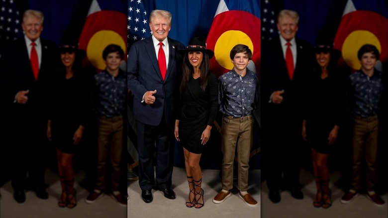 President Trump poses with Lauren Boebert and her son