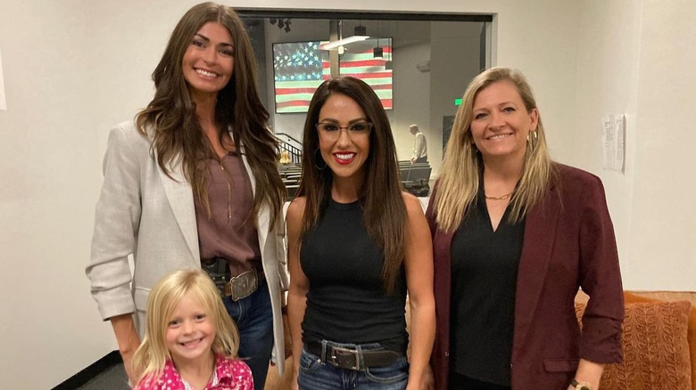 Lauren Boebert smiling with a group of people
