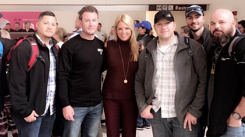 Pam Bondi smiling with a group of people