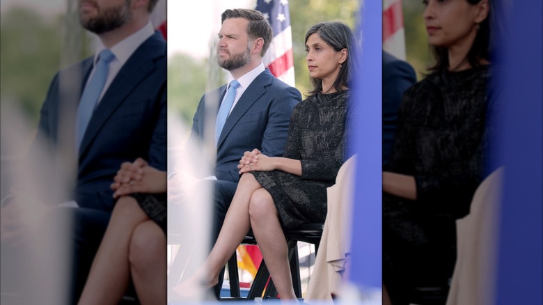 Usha Vance sitting cross-legged in a black dress at the national peace officers memorial service.