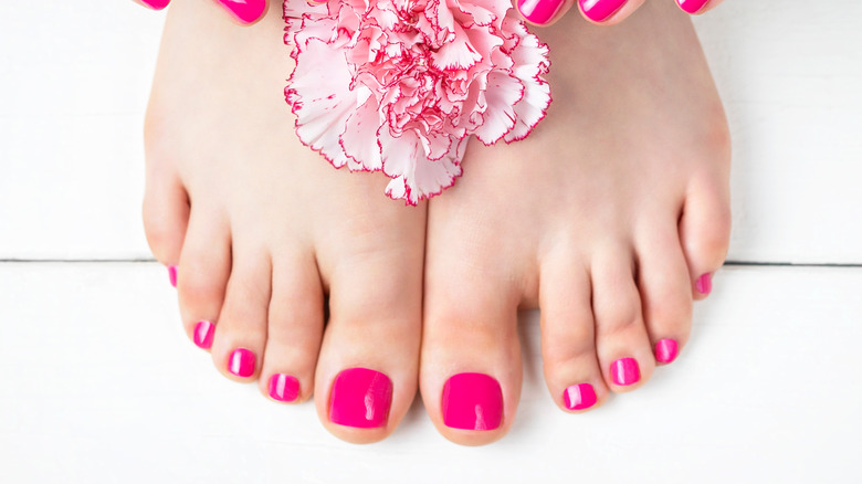 Bright pink toe nails