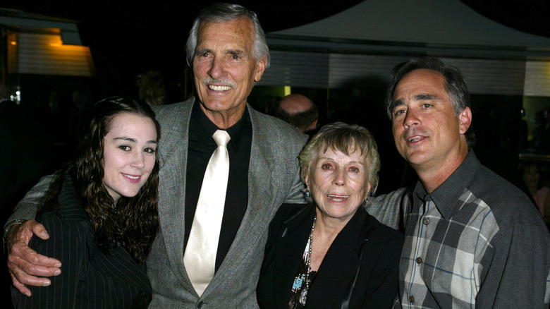Jennifer Weaver, Dennis Weaver, Gerry Weaver and Rob Weaver smiling and posing.