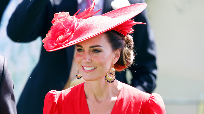 Princess Catherine in red hat