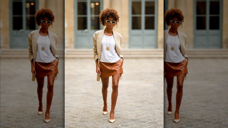 Cream blazer with brown skirt