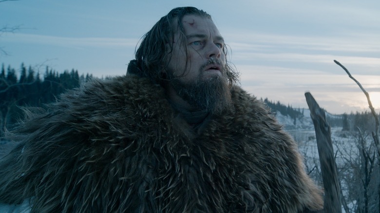 Leonardo DiCaprio with long hair and a beard in "The Revenant"