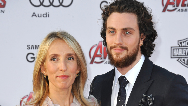Sam and Aaron Taylor-Johnson looking to the side