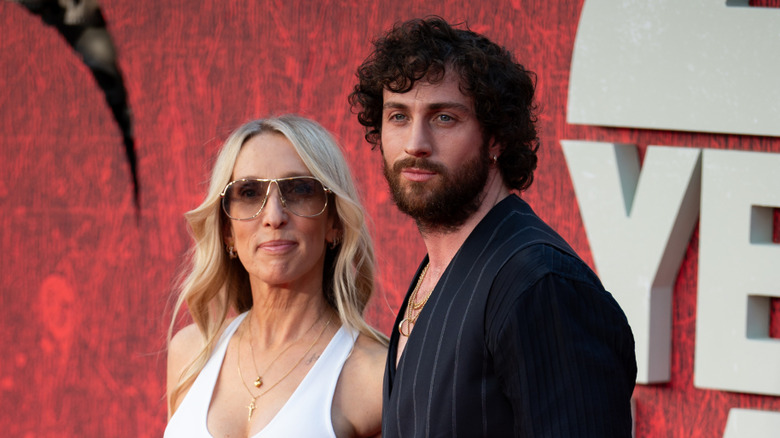 Sam and Aaron Taylor-Johnson looking to the side