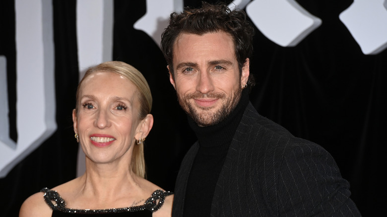 Sam and Aaron Taylor-Johnson smiling on the red carpet