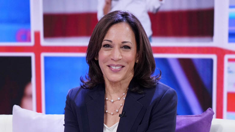 Kamala Harris sitting and smiling