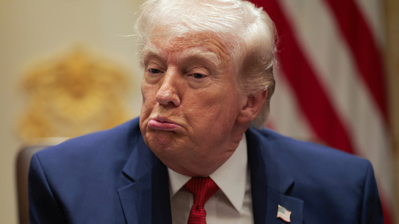 Donald Trump pursing his lips