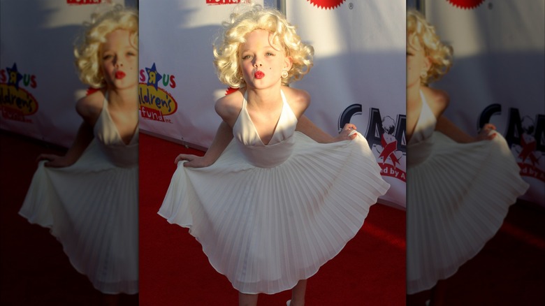 Elle Fanning in a Marilyn Monroe dress and wig
