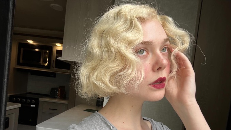Elle Fanning in a Marilyn Monroe wig