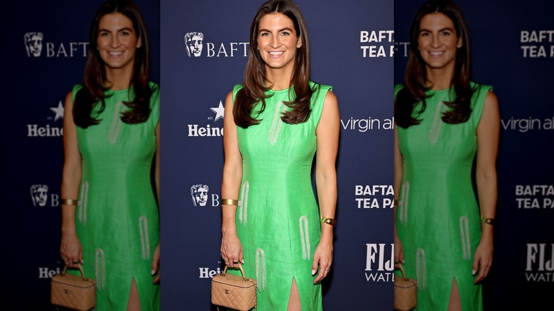 Kaitlin Collins smiles on the BAFTA Tea Party Red carpet