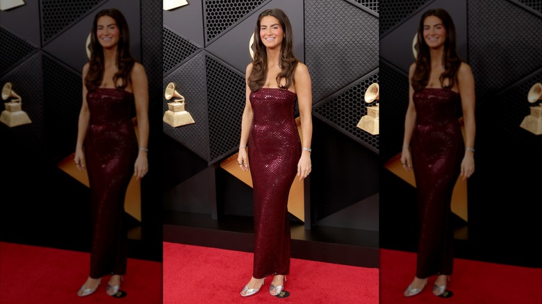 Kaitlan Collins in a deep burgundy tiled dress at the Grammys