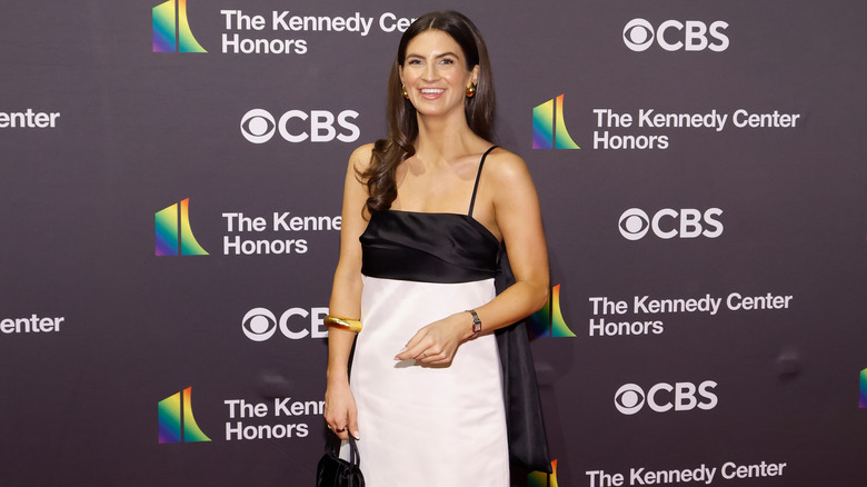 Kaitlan Collins smiling on the Kennedy Center red carpet