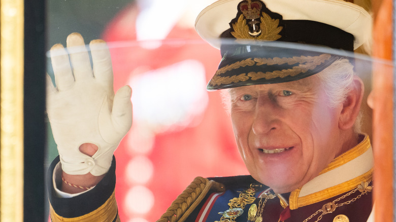 King Charles III waving
