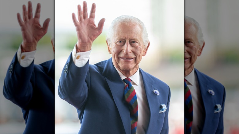 King Charles III waving