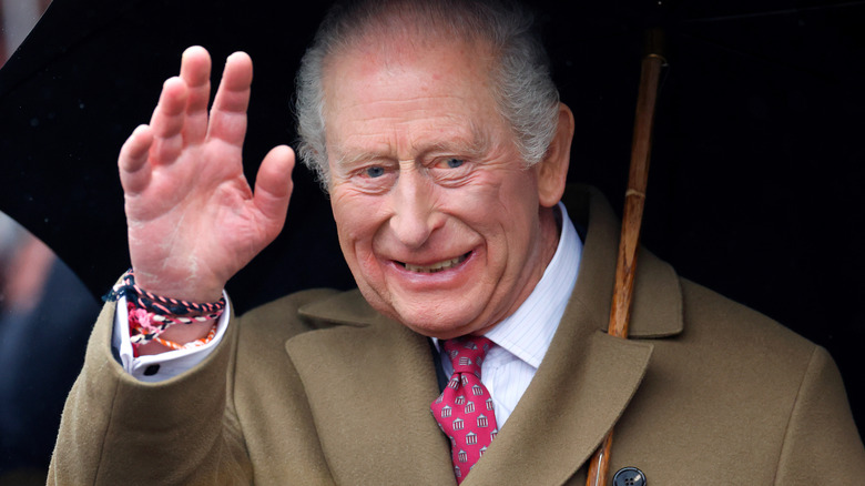 King Charles III waving